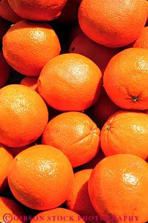 Stock Photo #6405: keywords -  agriculture bright california circle circular citrus color colorful crop crops farm farming food fruit grow growth lots many orange oranges pile produce ripe round sphere spheres vert