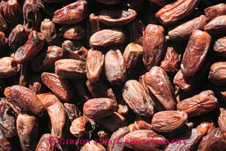 Stock Photo #6826: keywords -  agriculture brown crop crops date dates desiccate desiccated desiccates desiccating dried dry drying fig food fruit horz lots many multitude pod pods produce seed