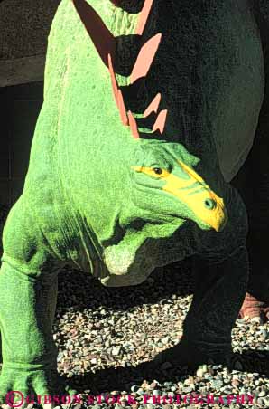 Stock Photo #8040: keywords - big bite carnivore carnivores dinosaur dinosaurs extinct green heavy huge imitate imitation mean mesozoic model prehistoric prehistory recreate recreated recreation replica reptile reptiles scare scary simulate simulation tall teeth vert