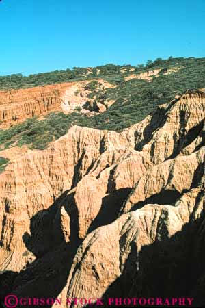 Stock Photo #7107: keywords - aging california canyon cycle ditch earth environment erode erodes eroding erosion form formation geologic geological geology gulch gully hole hydrogeologic loss nature park physical pines rock science slide sliding soil state stone torrey vert