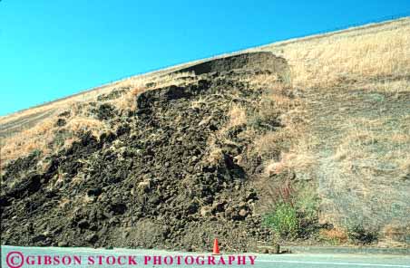 Stock Photo #7110: keywords -  aging canyon cycle dirt ditch earth environment erode erodes eroding erosion failure form formation geologic geological geology gulch gully hillside hole horz hydrogeologic landslide loss mud nature physical rock science slide sliding slope soil stone