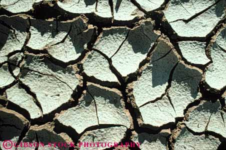 Stock Photo #7117: keywords - brittle contract contracted contraction crack cracked cracking deposit deposited desiccate desiccates desiccating dried drought dry drying earth environment form formation geologic geological geology horz moist mud muddy nature particles pattern physical science sediment sedimentation sediments shrink shrinkage shrinked wet zdessicated
