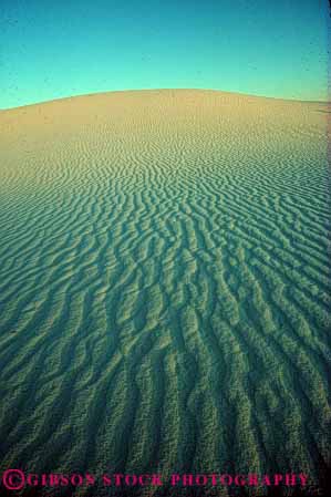 Stock Photo #7119: keywords -  accumulate accumulates accumulation barren blown changeable changing countless deposit desert desiccated dried dry dune dunes dynamic earth geologic geological geology grain grains gypsum heat hot lifeless mexico monument movable moving national nature new particle particles physical pile ripple ripples sand sanddune sanddunes sands science sediment sedimentary sedimentation vert white wind zenvironment