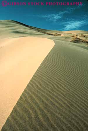 Stock Photo #7120: keywords -  accumulate accumulates accumulation barren blown california changeable changing countless curve deposit desert desiccated dried dry dune dunes dynamic earth environment geologic geological geology grain grains heat hot lifeless mojave movable moving nature particle particles physical pile ripple ripples sand sanddune sanddunes science sediment sedimentary sedimentation vert wind