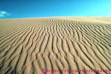 Stock Photo #7126: keywords - accumulate accumulates accumulation barren blown california changeable changing countless deposit desert desiccated dried dry dune dunes dynamic earth environment geologic geological geology grain grains heat horz hot lifeless mojave movable moving nature particle particles pattern physical pile ripple ripples sand sanddune sanddunes science sediment sedimentary sedimentation wind
