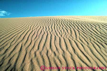 Stock Photo #7126: keywords -  accumulate accumulates accumulation barren blown california changeable changing countless deposit desert desiccated dried dry dune dunes dynamic earth environment geologic geological geology grain grains heat horz hot lifeless mojave movable moving nature particle particles pattern physical pile ripple ripples sand sanddune sanddunes science sediment sedimentary sedimentation wind