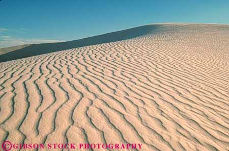 Stock Photo #7128: keywords -  accumulate accumulates accumulation barren blown changeable changing countless deposit desert desiccated dried dry dune dunes dynamic earth environment geologic geological geology grain grains gypsum heat horz hot lifeless mexico mineral monument movable moving national nature new particle particles physical pile ripple ripples sand sanddune sanddunes sands science sediment sedimentary sedimentation white wind