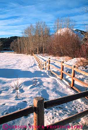 Stock Photo #7215: keywords -  alpine clean climate cold environment fence freeze freezing frozen ice icy idaho landscape nature outdoor peak peaks precipitation pristine pure rail relief resort rugged scenery scenic snow summit sun terrain valley vert weather wild wilderness winter wood