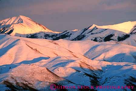 Stock Photo #7222: keywords - alpenglow alpine clean climate cold desolate desolation dusk environment freeze freezing frozen horz hostile ice icy idaho inhospitable landscape mount mountain mountains mt. nature outdoor peak peaks precipitation pristine pure range relief resort rugged scenery scenic slope sloping snow steep summit sun sunset terrain valley weather wild wilderness winter
