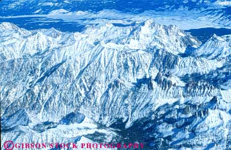 Stock Photo #7231: keywords - aerial aerials alpine clean climate cold desolate desolation environment freeze freezing frozen geologic geological geology horz hostile ice icy idaho inhospitable landscape mount mountain mountains mt. nature outdoor pattern peak peaks precipitation pristine pure range relief rock rocks rugged scenery scenic slope sloping snow steep summit terrain texture weather wild wilderness winter