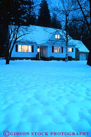 Stock Photo #7236: keywords -  building climate climatology cold dusk freeze freezing frozen home ice icy light lighting lights lit mood nature precipitation released residence residential season snow vert warm weather winter