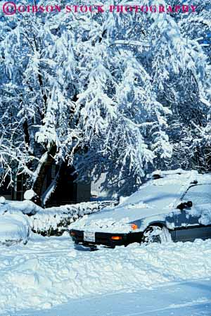 Stock Photo #7242: keywords -  auto automobile autos buried bury car cars climate climatology cold freeze freezing frozen ice icy inconvenience inconvenient nature outdoor outside park parked parking pile precipitation residence residential season snow under vehicle vert weather winter