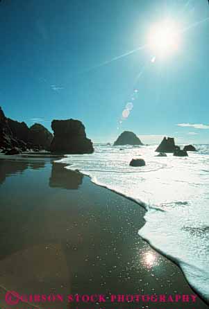 Stock Photo #7252: keywords -  beach burst california coast coastal continent edge land landscape marine maritime mood nature ocean reflecting reflection reflects sand scenery scenic sea seascape seashore shore shoreline sun sunny surf vert wave waves