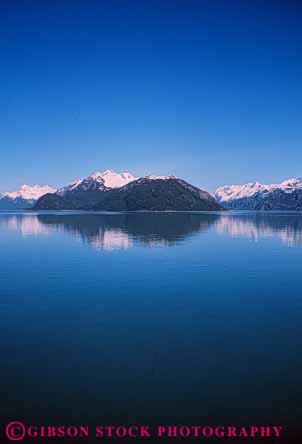 Stock Photo #7263: keywords - alaska away bay blue calm coast coastal continent edge flat glacier land landscape marine maritime mirror mountain mountains national nature ocean park peace peaceful quiet reflect reflecting reflection reflects remote scenery scenic sea seascape seashore serene shore shoreline smooth snow solitary solitude still surf vert wave waves