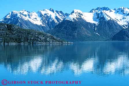 Stock Photo #7264: keywords - alaska away bay blue calm coast coastal continent edge flat glacier horz land landscape marine maritime mirror mountain mountains national nature ocean park peace peaceful quiet reflect reflecting reflection reflects remote scenery scenic sea seascape seashore serene shore shoreline smooth snow solitary solitude still surf wave waves