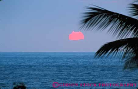Stock Photo #7271: keywords - between celestial circle circular cloud clouds dawn dusk evening full hawaii horz landscape mood moody morning night ocean orange orbit over palm pink round scenery scenic sea seascape set sky sunset sunsets tree water