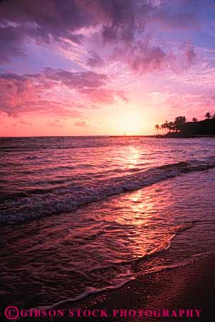 Stock Photo #7273: keywords -  beach coast dawn dusk glisten glistening glistens hawaii landscape mood moody nature ocean orange purple reflecting reflection reflects sand scenery scenic shore shoreline sun sunrise sunset surf vert warm water wave waves