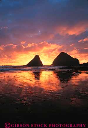 Stock Photo #7277: keywords -  beach coast dawn devils dusk elbow glisten glistening glistens island islands landscape mood moody nature ocean orange oregon park pinnacle pinnacles reflect reflecting reflection reflects scenery scenic shore shoreline silhouette stack stacks state sun sunrise sunset vert warm water