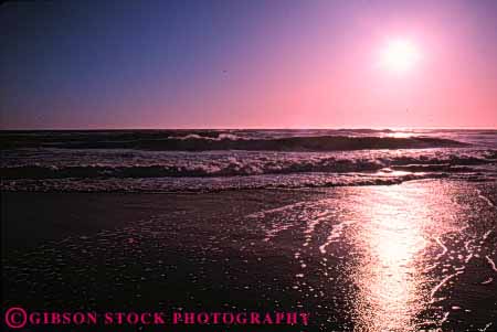 Stock Photo #7279: keywords -  beach coast coastal dawn dusk glisten glistening glistens horizon horz landscape mood moody nature ocean reflect reflection scenery scenic shore shoreline sun sunrise sunset surf warm water