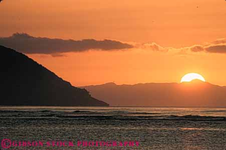 Stock Photo #7285: keywords -  coast coastal dawn dusk hawaii horz island landscape mood moody nature ocean scenery scenic shore shoreline sun sunrise sunset warm water