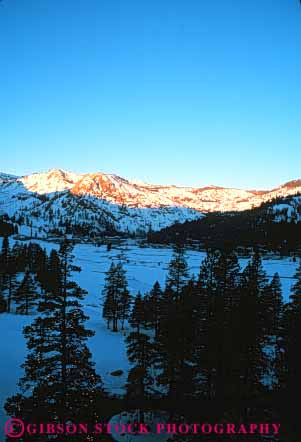 Stock Photo #7292: keywords -  alpenglow california climate dawn dusk lake landscape mood moody mountain mountains nature scenery scenic sierra snow squaw sun sunrise sunset tahoe valley vert warm weather winter