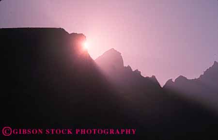 Stock Photo #7295: keywords - cloud clouds dawn dusk horz landscape mood moody mountain mountains nature scenery scenic sun sunrise sunset warm weather