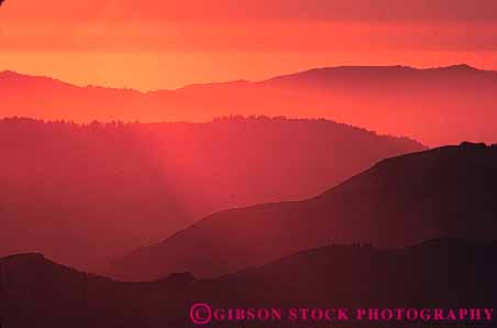 Stock Photo #7309: keywords -  color colorful dawn dusk hill hills horz landscape mood moody mountain mountains nature orange red ridge ridges scenery scenic sun sunrise sunset warm