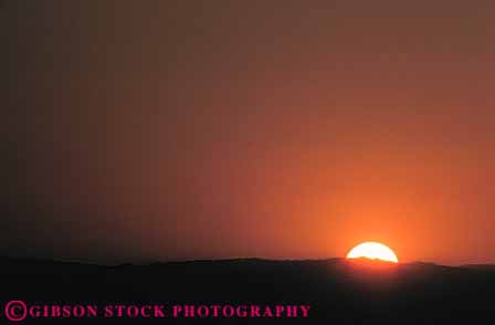 Stock Photo #7310: keywords -  color colorful dawn dusk hill hills horz landscape mood moody mountain mountains nature orange red ridge scenery scenic sun sunrise sunset warm