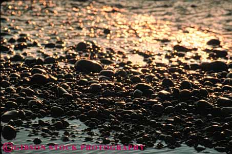 Stock Photo #7316: keywords -  abstract abstraction abstracts beach coast coastal cobble cobbles dawn dusk horz mood moody nature pebble pebbles rock rocks shore shoreline stone stones sun sunrise sunset warm water