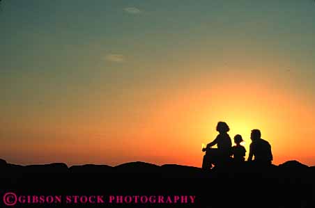 Stock Photo #7327: keywords -  child children dawn dusk evening family father horz husband kid mood moody morning mother nature parent parents people resort share silhouette silhouettes social sun sunrise sunset together vacation warm wife