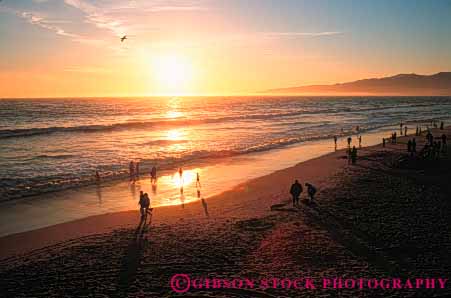 Stock Photo #7329: keywords -  beach california dawn dusk evening horz monica mood moody morning nature people play playing resort sand santa silhouette silhouettes social stroll sun sunrise sunset surf travel vacation walk walking warm water wave waves