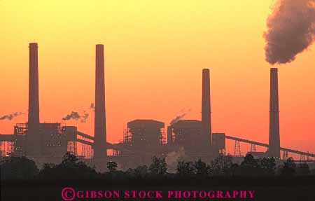 Stock Photo #7340: keywords -  air building buildings dawn dusk electrical electricity emission energy evening exhaust factory generate generates generating grid horz industry manmade mood moody morning orange plant pollution power richmond silhouette silhouettes smoke stacks steam structure sun sunrise sunset tall technology texas tower towers warm