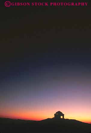 Stock Photo #7341: keywords - alone building buildings cabin cabins cottage cottages dawn dusk evening getaway home homes house isolate isolated little lonely manmade mood moody morning mountain mountaintop orange privacy private remote silhouette silhouettes small solitary solitude structure sun sunrise sunset vert warm