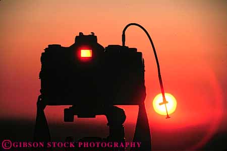 Stock Photo #7348: keywords -  camera dawn dusk evening horz manmade mood moody morning photographer photography silhouette silhouettes structure sun sunrise sunset warm