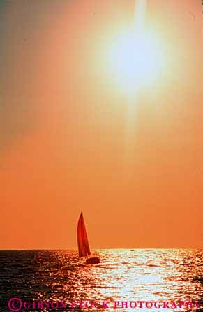 Stock Photo #7352: keywords - boat boater boating boats coast coastal dawn dusk evening manmade marine maritime mood moody ocean sail sailboat sea shore shoreline silhouette silhouettes structure sun sunrise sunset vert warm water yacht