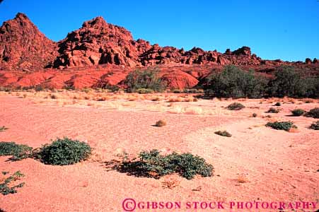 Stock Photo #7366: keywords -  arid bright climate climatology desert desiccate dried drought dry drying dryness environment evaporate fire habitat horz hot landscape nature nevada of parch parched park plant plants sandstone sparse state stream streambed sunny valley vegetation warm wash waterless xeric