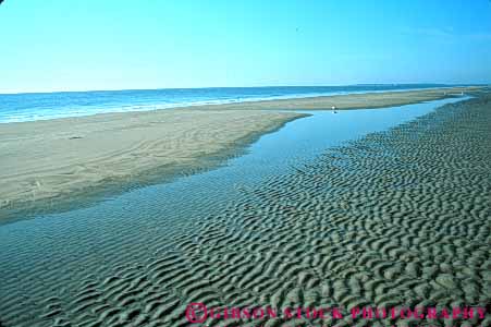 Stock Photo #7377: keywords - beach calm churn churning coast coastal continent deposit deposits edge empty environment erode eroded eroding erosion erosive georgia horz island jekyll landscape marine maritime nature ocean pattern quiet ripple ripples sand sea seascape seashore sediment sedimentary sediments shore shoreline surf water wave waves