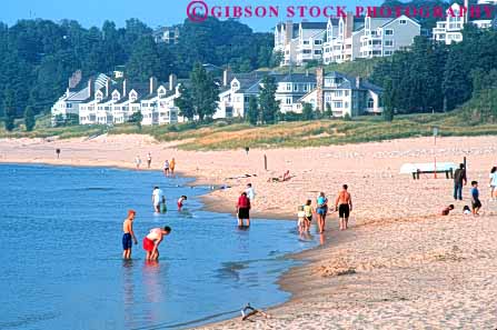 Stock Photo #7389: keywords -  beach coast coastal continent deposit deposits edge environment erode eroded eroding erosion erosive holland horz lake landscape marine maritime michigan nature ocean people resort sand sea seascape seashore sediment sedimentary sediments shore shoreline sunny sunshine surf travel vacation water wave waves