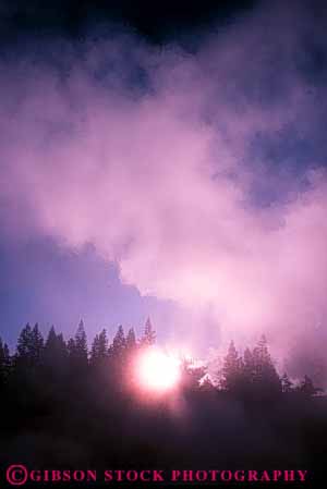 Stock Photo #7401: keywords -  abstract abstraction abstracts basin bright burst celestial cloud clouds fog foggy forest geysers light mist misty mood moody national norris park pink sky solar star steam sun sunny sunshine tree trees vapor vert wyoming yellowstone