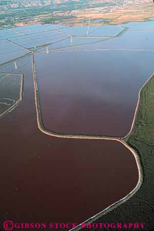 Stock Photo #7416: keywords -  above aerial aerials bay california dike diked earth environment evaporate evaporating evaporative extraction francisco habitat landscape lowland lowlands marsh mineral nature physical ponds resource resources salt saltwater san scenery scenic science shallow vert water wet wetland wetlands