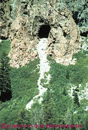 Stock Photo #7424: keywords -  cave caves dark doorway earth entrance environment exit formation geologic geological geology hole mine mining nature open opening passage rock rocky science stone tunnel vert