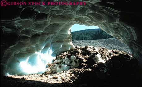 Stock Photo #7426: keywords -  alberta canada cavall cave caves climate cold dark doorway earth entrance environment exit formation freeze freezing froze frozen geologic geological geology glacial glacier hole horz ice icy jasper melt national nature open opening park passage rock rocky science snow stone tunnel wet winter