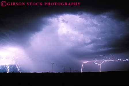 Stock Photo #7435: keywords -  arc bolt bright climate cloud clouds dark dawn dusk electric electrical electricity environment evening flash horz lightening lightning morning nature night precipitation rain rainy spark sparks storm threaten threatening voltage weather