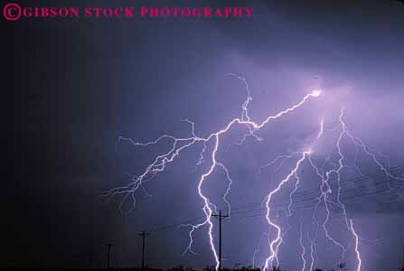 Stock Photo #7436: keywords - arc bolt bright climate cloud clouds dark dawn dusk electric electrical electricity environment evening flash horz lightening lightning morning nature night precipitation rain rainy spark sparks storm threaten threatening voltage weather