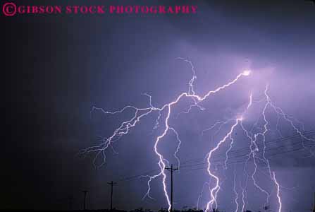 Stock Photo #7436: keywords -  arc bolt bright climate cloud clouds dark dawn dusk electric electrical electricity environment evening flash horz lightening lightning morning nature night precipitation rain rainy spark sparks storm threaten threatening voltage weather