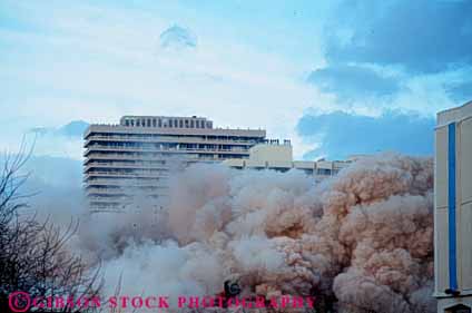 Stock Photo #7460: keywords -  air airborne breath breathing building cloud clouds demolish dust eye hazard hazardous health horz hotel implosion irritant irritate mapes nevada occupational particle particles pollute polluted polluting pollution reno vision