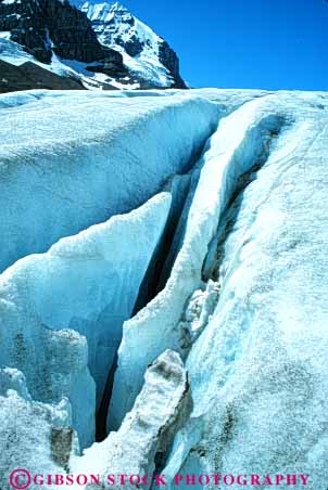 Stock Photo #7473: keywords -  alberta athabasca canada climate cold crack cracked cracks crevasses environment freeze freezing frozen glacial glacier glaciers habitat ice icy jasper landscape mountain mountains national nature park scenery scenic snow vert weather winter