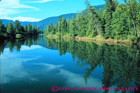 Stock Photo #6937: keywords -  calm clark creek downhill drain drainage environment flow flowing flows forest fork freshwater gravity horz lake landscape montana nature peaceful pond quiet reflect reflecting reflection river riverbed runoff scenic serene still stream tree trees tributary water waterway wilderness