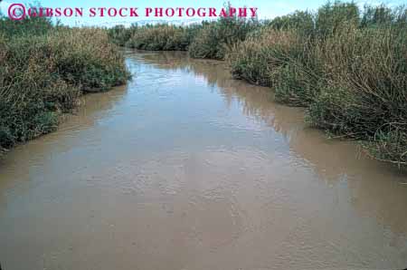 Stock Photo #6938: keywords -  alamo brown california creek dirt dirty downhill drain drainage environment eroding erosion erosive flow flowing flows freshwater gravity horz laden landscape mud muddy murky nature river riverbed runoff salton scenic sea sediment silt silty stream tributary turbid turbidity water waterway