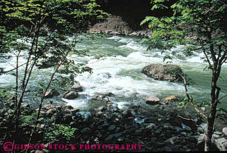 Stock Photo #6943: keywords -  aerate aerated aeration agitate agitated bubble bubbles creek current dangerous downhill drain drainage environment fast flow flowing flows freshwater gravity horz landscape nature rapid rapids river riverbed rough runoff scenic snoqualmie steep stream swift tributary turbulence turbulent washington water waterway white whitewater